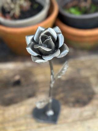 Top down view of handcrafted steel rose petals